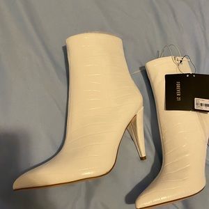 White faux leather heeled boots